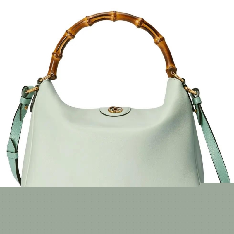 G*u*i top handle bags